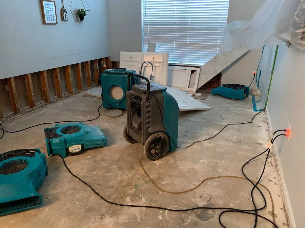 Dehumidifier in flood-cut room for Water Damage Restoration in London